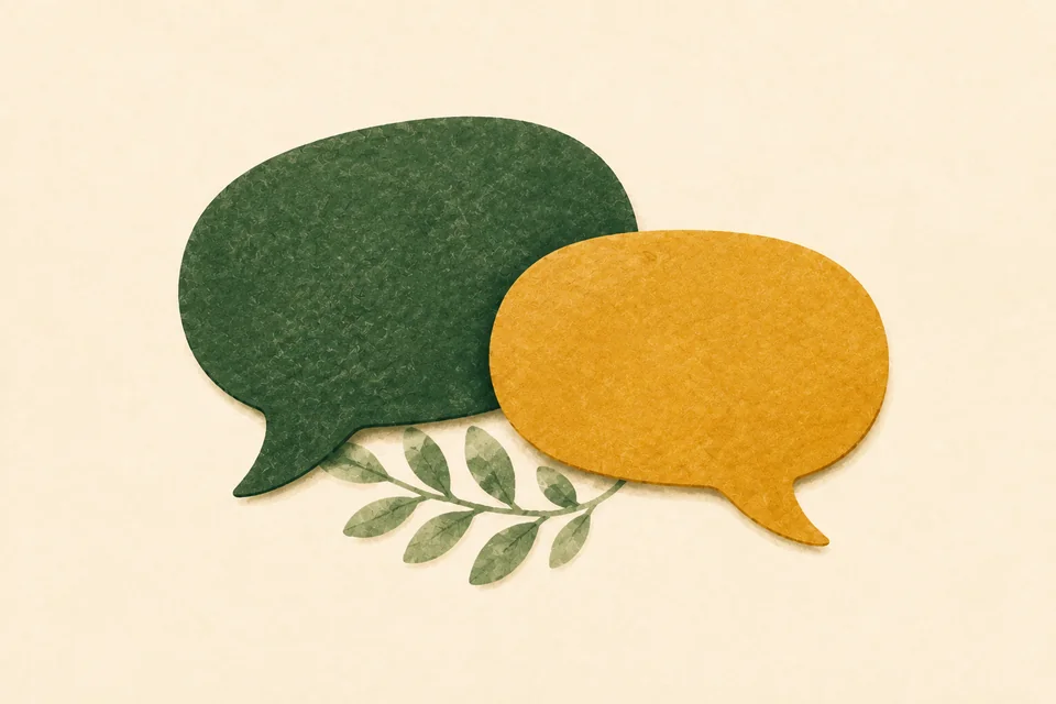 Illustration of green and ochre speech shapes above a leafy sprig.